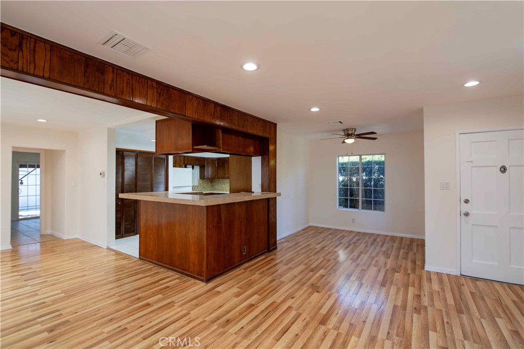 6417 White Oak Avenue Reseda, CA 91335 - Photo 5 of 50 a living room with stainless steel appliances kitchen island wooden floors and view living room