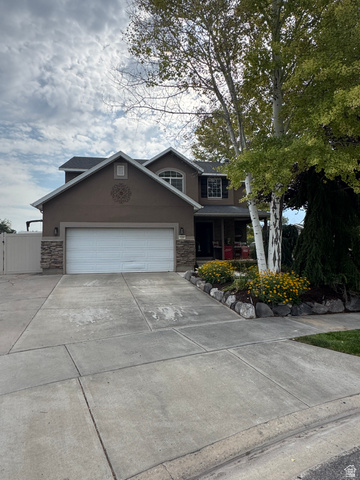 1237 South 260 West Payson, UT 84651 - Photo 1 of 81 Two-story residence featuring a two-car garage with a concrete driveway
