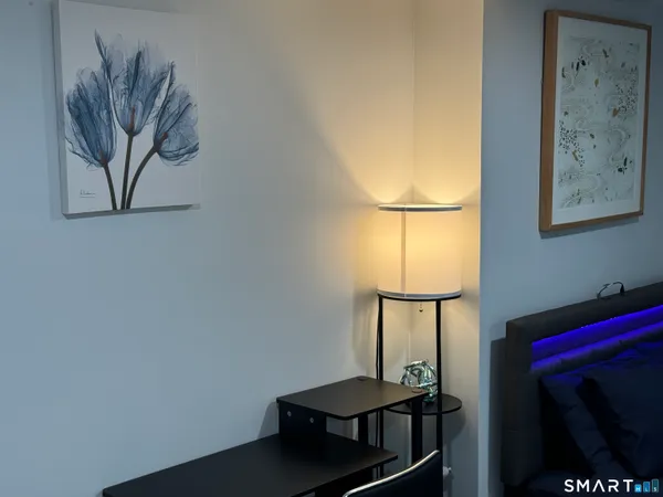 a room with workbench and window