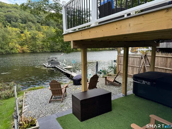 a view of a lounge chairs in the roof deck