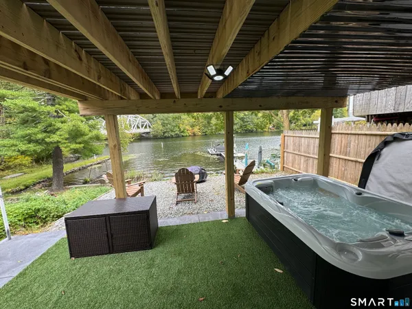 a patio view with a table and chairs