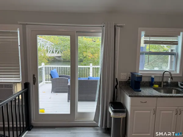 a kitchen with sink and window