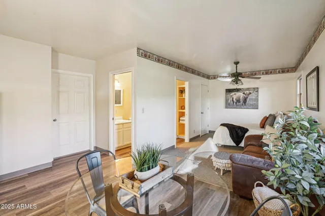 a view of a yard with a house in the background