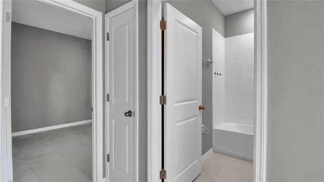 a view of a bathroom with shower
