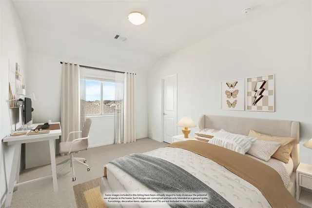 a bedroom with a bed and a cabinets