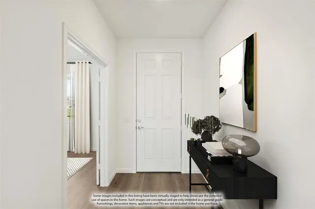 a room with a table and chairs