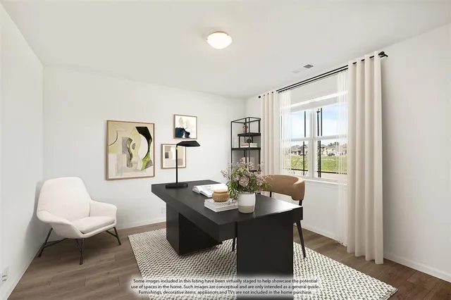 a living room with furniture and window