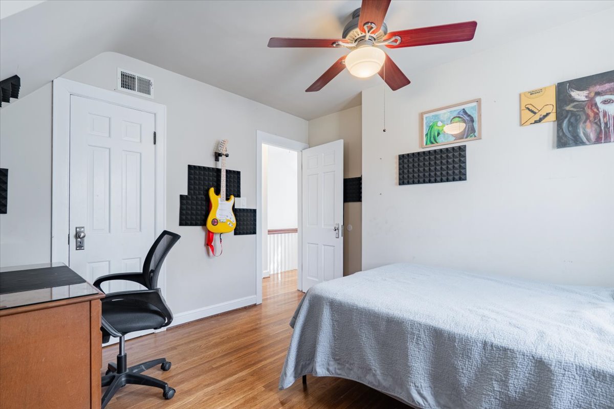 413 Grant Street Normal, IL 61761 - Photo 23 of 40 a bedroom with furniture and a window