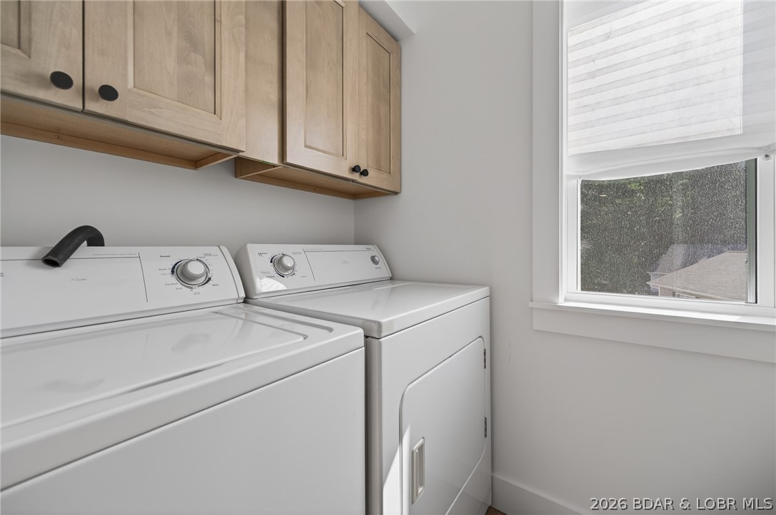 25 Old Sassafrass Road Eldon, MO 65026 - Photo 13 of 58 Extra nice laundry room on upper level with natura