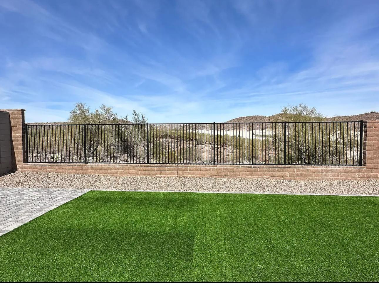 13302 West Eagle Feather Road Peoria, AZ 85383 - Photo 4 of 12 a view of outdoor space with deck and yard