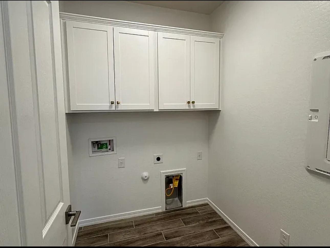 13302 West Eagle Feather Road Peoria, AZ 85383 - Photo 10 of 12 a view of storage and utility room with wooden floor