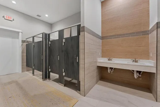 a terrace with outdoor seating and city view