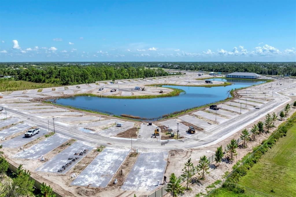 9001 Gasparilla Road, Unit 42 Placida, FL 33946 - Photo 56 of 75 a view of a swimming pool with a yard