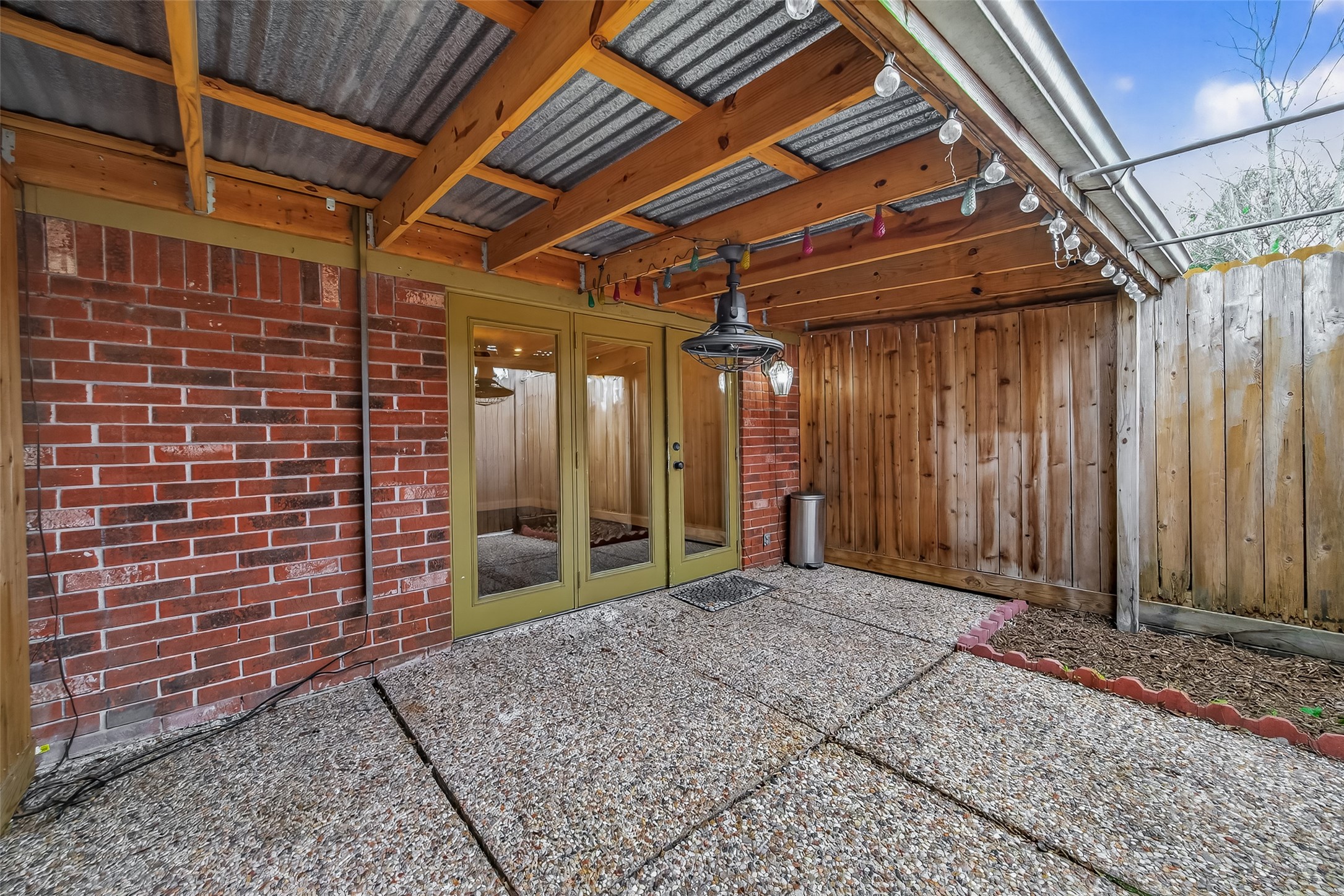 11550 Chimney Rock Road, Unit 330 Houston, TX 77035 - Photo 25 of 30 Covered patio with fan.