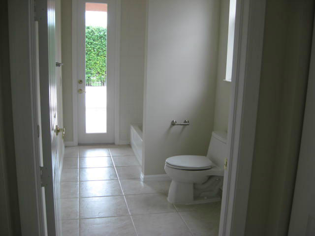22194 Braddock Place Boca Raton, FL 33428 - Photo 11 of 20 a bathroom with a toilet and a sink