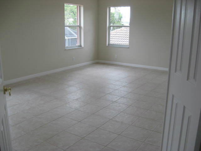 22194 Braddock Place Boca Raton, FL 33428 - Photo 12 of 20 an empty room with windows