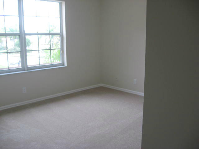 22194 Braddock Place Boca Raton, FL 33428 - Photo 17 of 20 an empty room with a window
