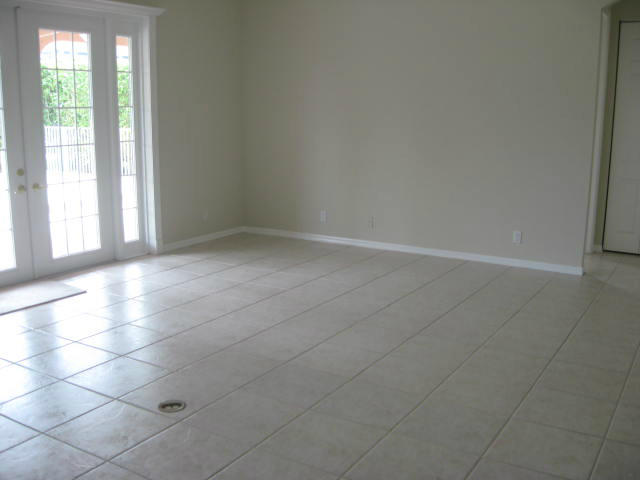 22194 Braddock Place Boca Raton, FL 33428 - Photo 6 of 20 a view of an empty room and window