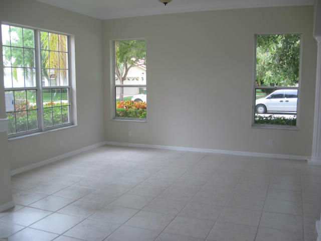 22194 Braddock Place Boca Raton, FL 33428 - Photo 7 of 20 an empty room with windows