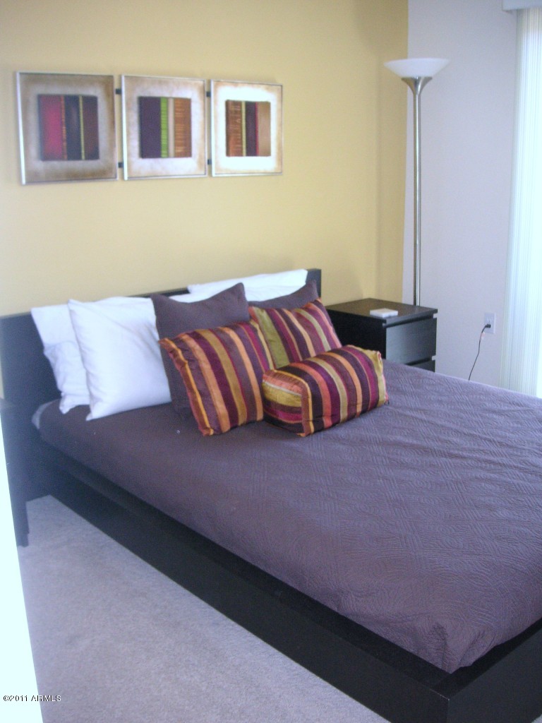 3935 East Rough Rider Road, Unit 1093 Phoenix, AZ 85050 - Photo 19 of 20 Bedroom 2