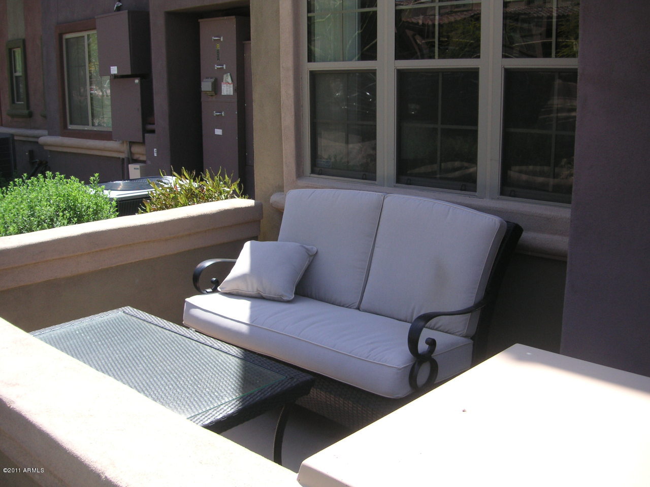 3935 East Rough Rider Road, Unit 1093 Phoenix, AZ 85050 - Photo 3 of 20 Front Patio