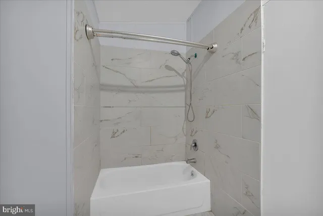 a bathroom with a bathtub