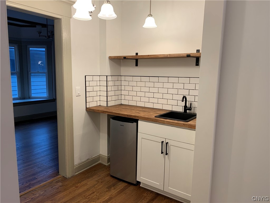 2017 James Street Syracuse, NY 13206 - Photo 9 of 29 Wet Bar View into Dining Room