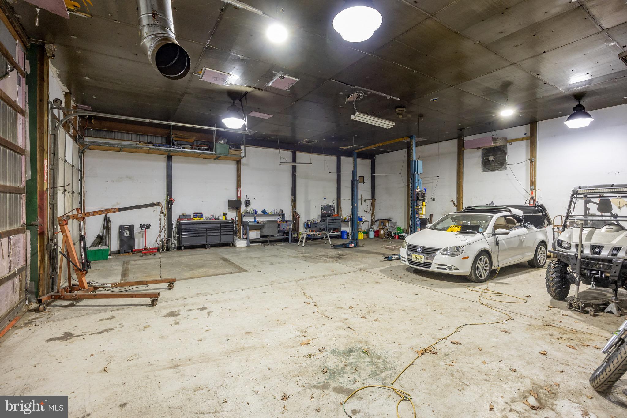 687 Jackson Road Atco, NJ 08004 - Photo 18 of 20 a view of parking garage with parked cars