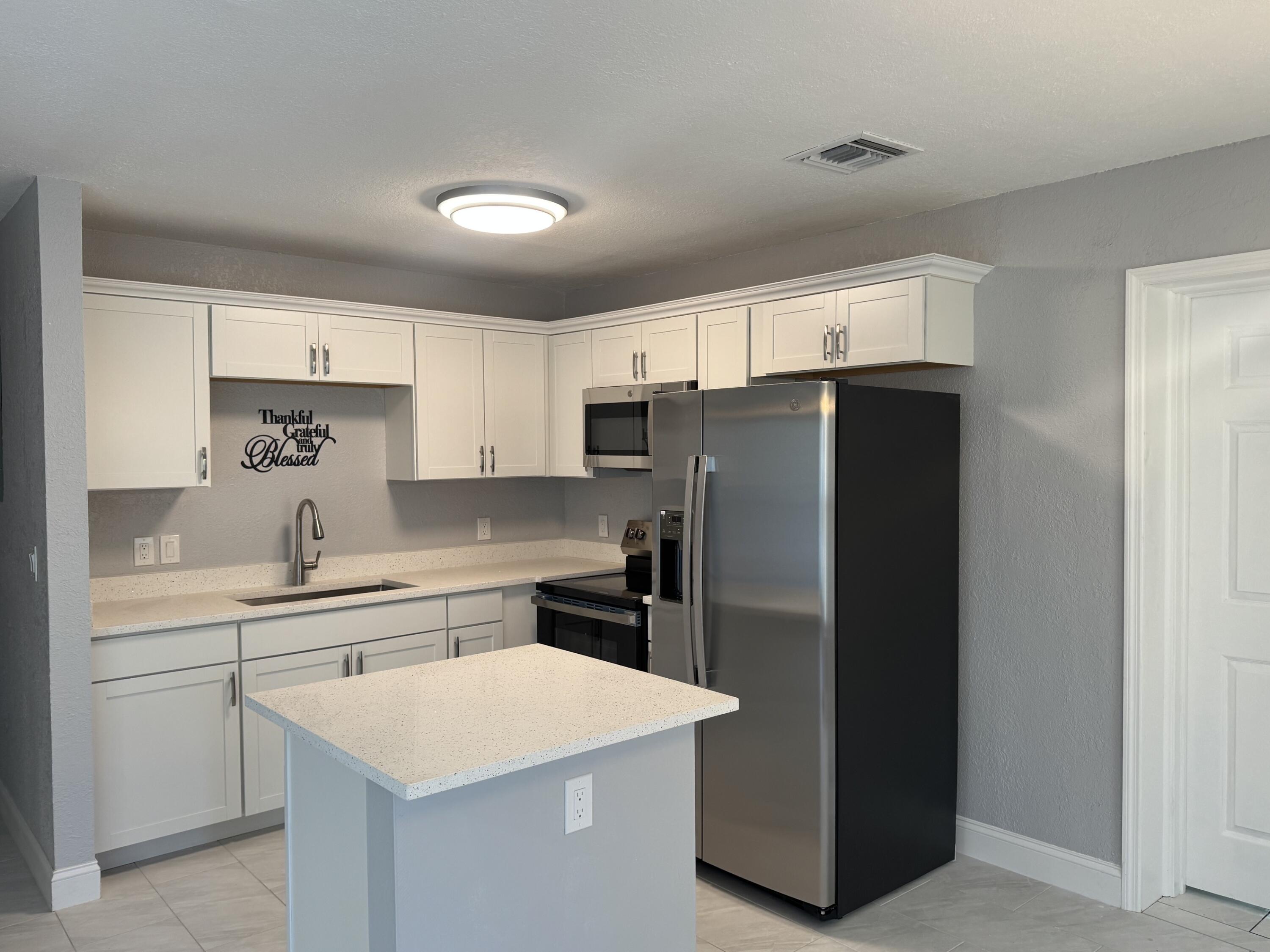 1321 West 3rd Street Riviera Beach, FL 33404 - Photo 5 of 12 Kitchen