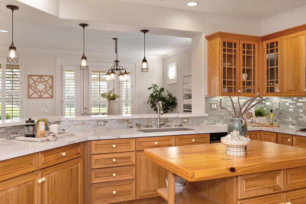 6014 Timberlodge Lane Roseville, CA 95747 - Photo 15 of 63 a kitchen with a sink and cabinets