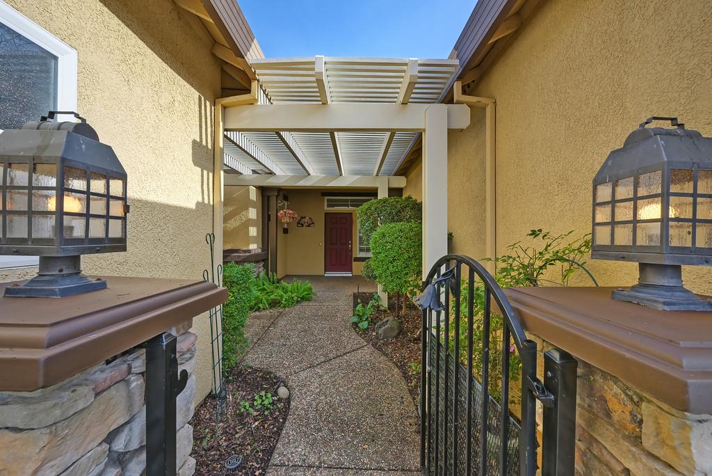 6014 Timberlodge Lane Roseville, CA 95747 - Photo 3 of 63 a view of house with a chairs and table in a patio