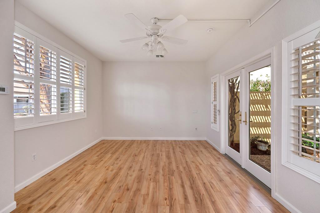 6014 Timberlodge Lane Roseville, CA 95747 - Photo 40 of 63 wooden floor in an empty room with a window