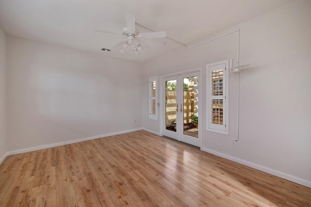 6014 Timberlodge Lane Roseville, CA 95747 - Photo 41 of 63 wooden floor in an empty room with a window