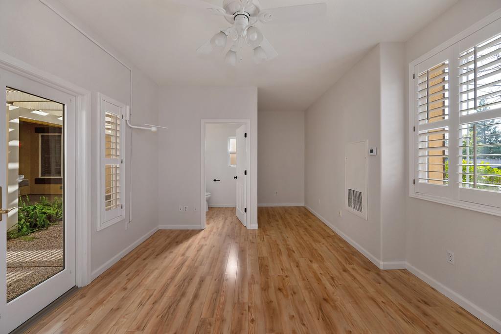6014 Timberlodge Lane Roseville, CA 95747 - Photo 43 of 63 wooden floor in an empty room with a window