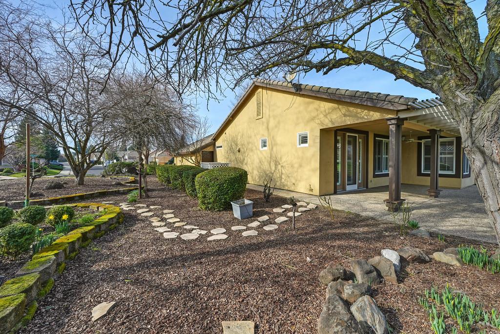 6014 Timberlodge Lane Roseville, CA 95747 - Photo 53 of 63 a view of a house with a yard