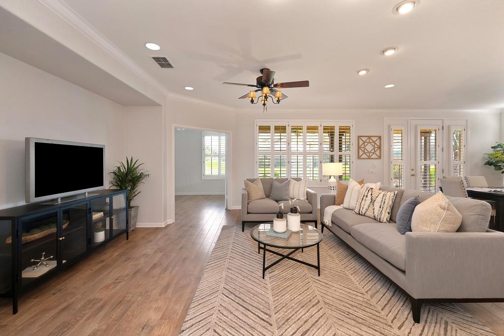 6014 Timberlodge Lane Roseville, CA 95747 - Photo 7 of 63 a living room with furniture and a flat screen tv