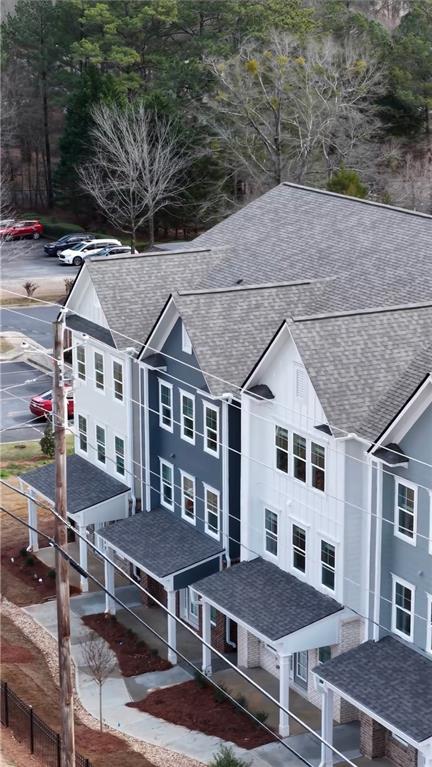 200 Harrell Way Fayetteville, GA 30215 - Photo 13 of 14 a aerial view of a brick building next to a yard