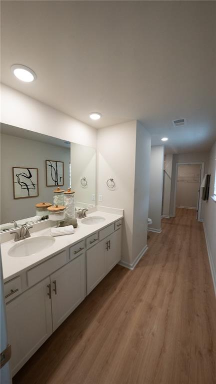 200 Harrell Way Fayetteville, GA 30215 - Photo 8 of 14 a large bathroom with a sink mirror and a toilet