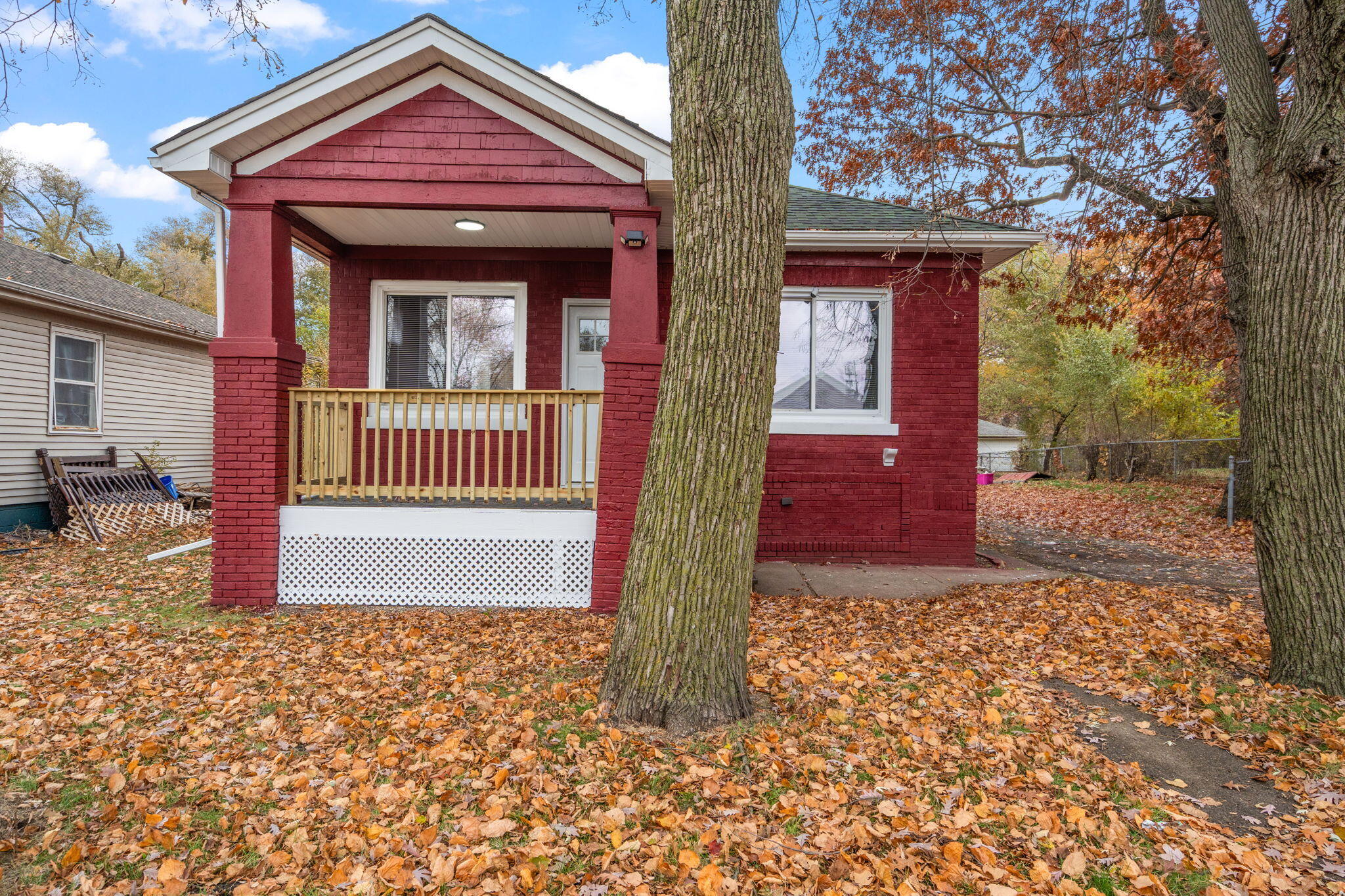 1335 Williams Street Gary, IN 46404 - Photo 1 of 22 a front view of a house with a yard