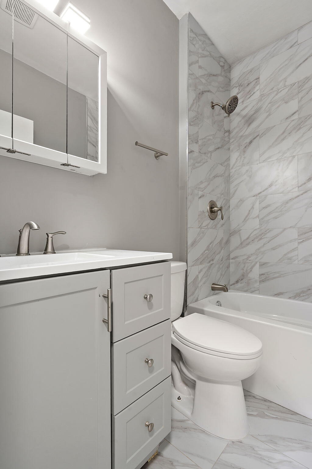 1335 Williams Street Gary, IN 46404 - Photo 11 of 22 a bathroom with a sink a toilet and shower