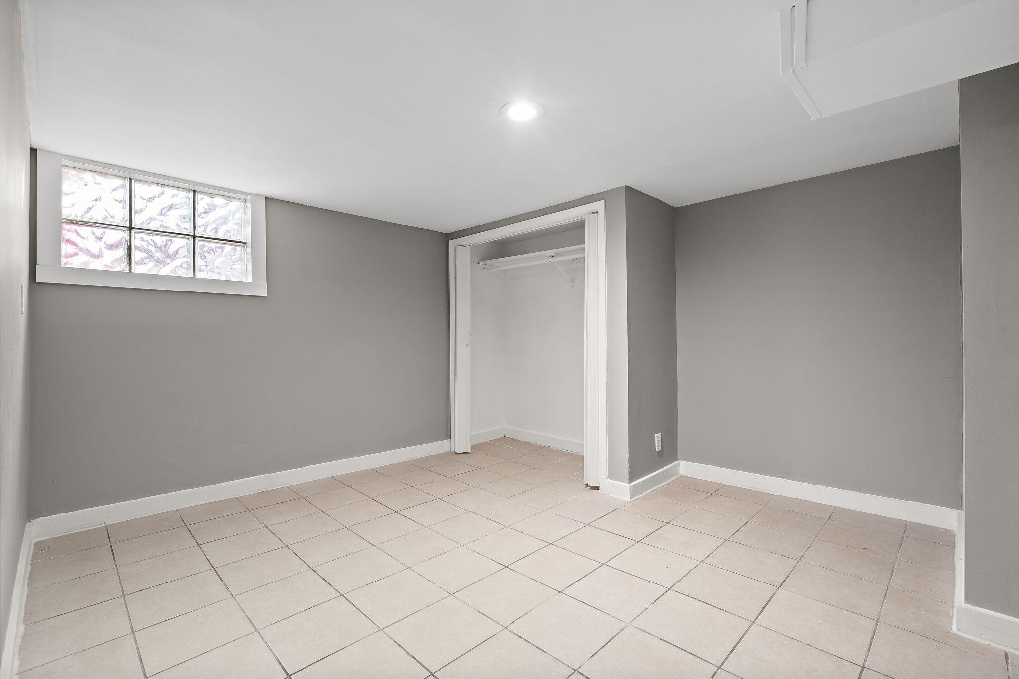 1335 Williams Street Gary, IN 46404 - Photo 16 of 22 a view of an empty room and window