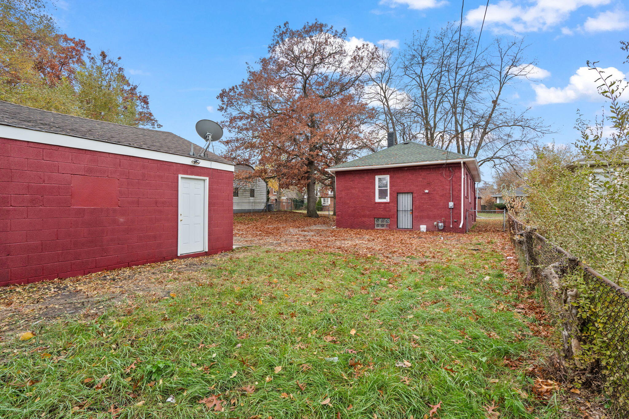 1335 Williams Street Gary, IN 46404 - Photo 19 of 22 a front view of a house with a yard