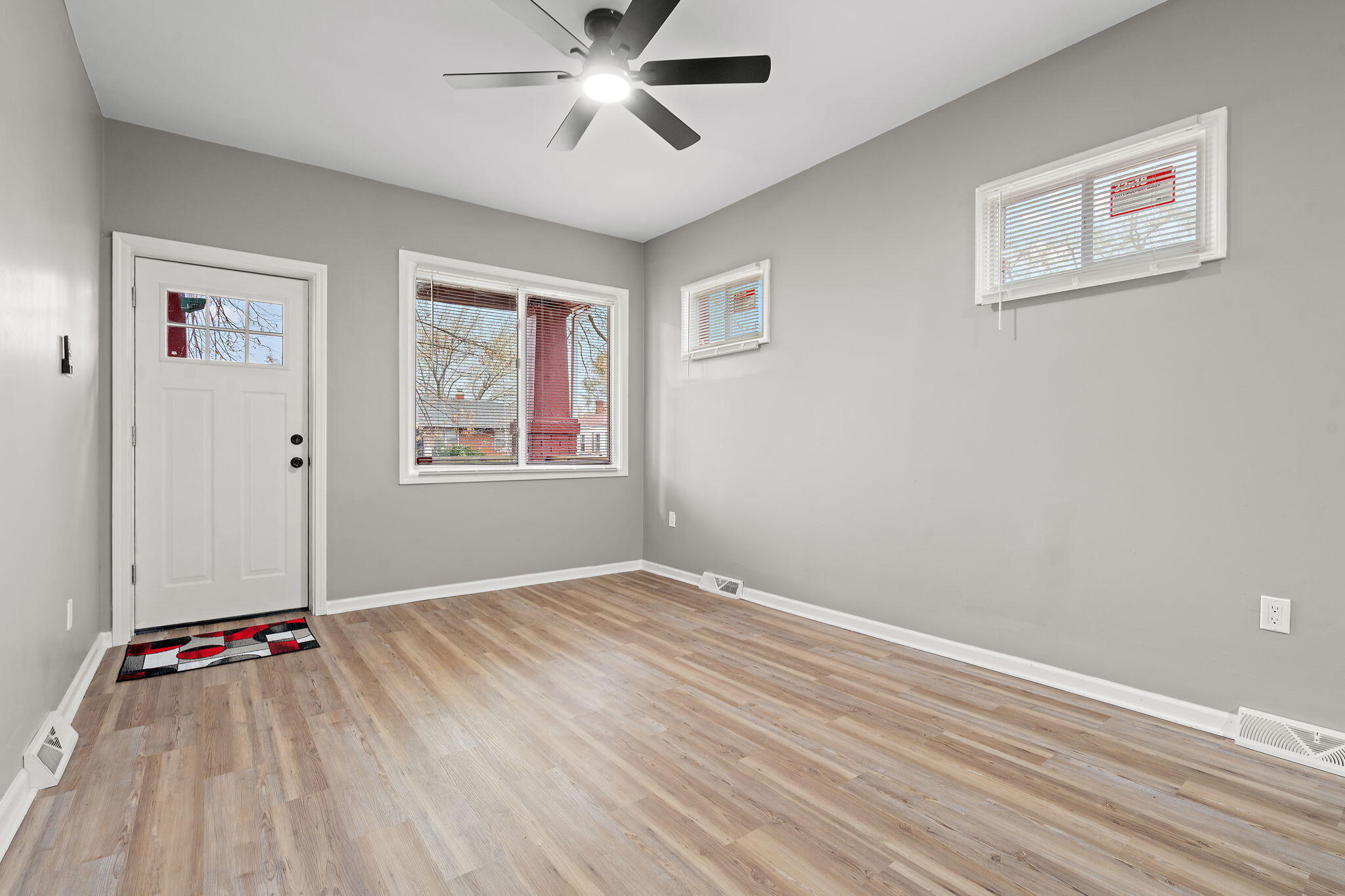 1335 Williams Street Gary, IN 46404 - Photo 4 of 22 a view of livingroom with hardwood floor and window