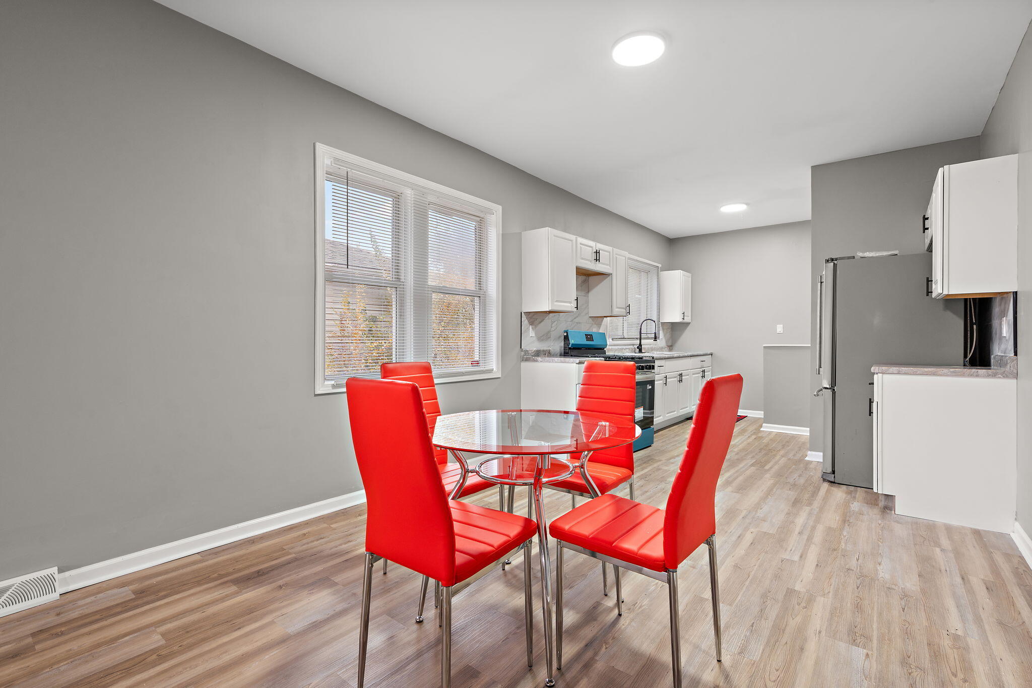 1335 Williams Street Gary, IN 46404 - Photo 6 of 22 a view of a dining room with furniture and wooden floor