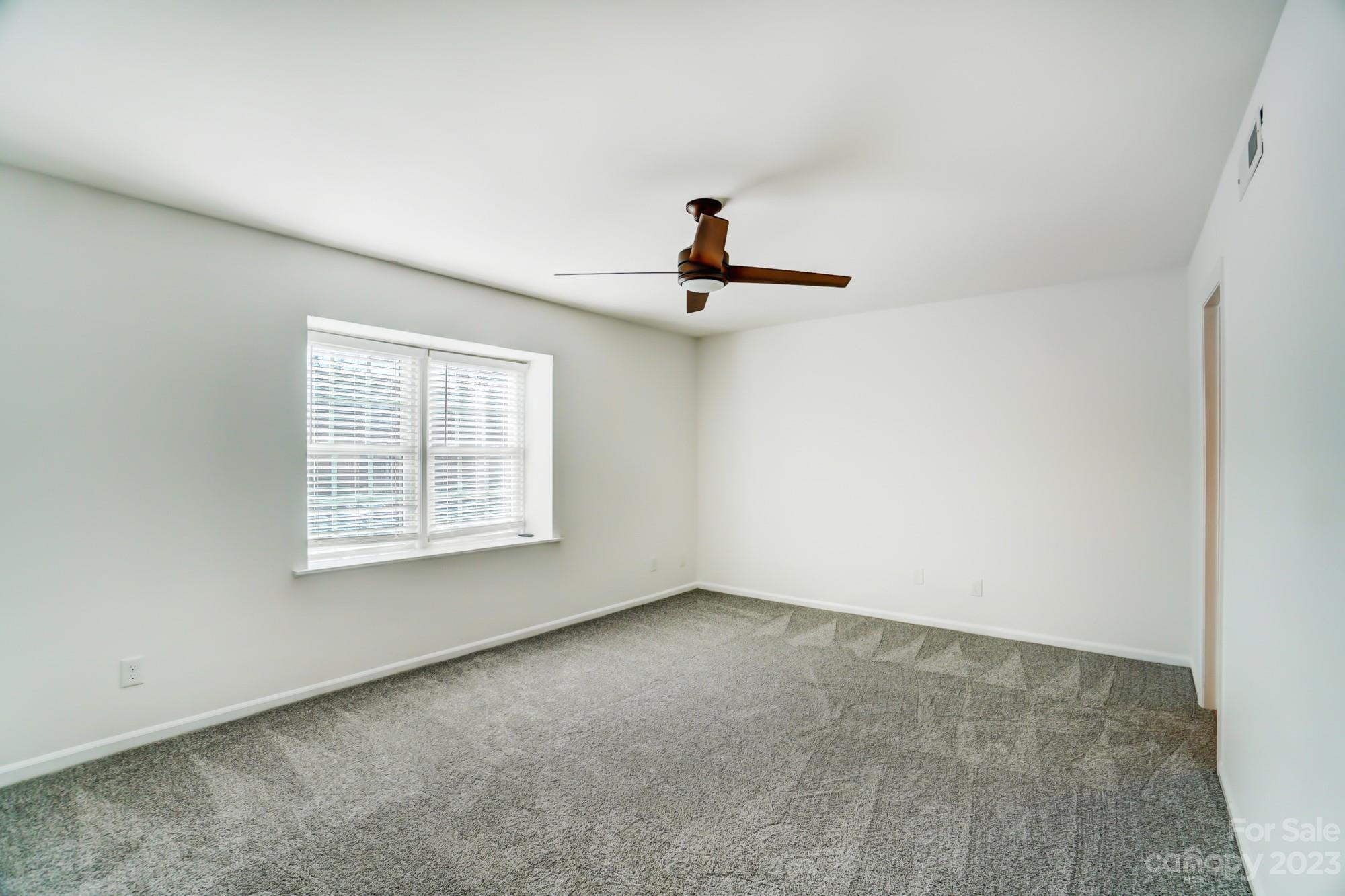3500 Colony Road, Unit E Charlotte, NC 28211 - Photo 24 of 37 an empty room with windows