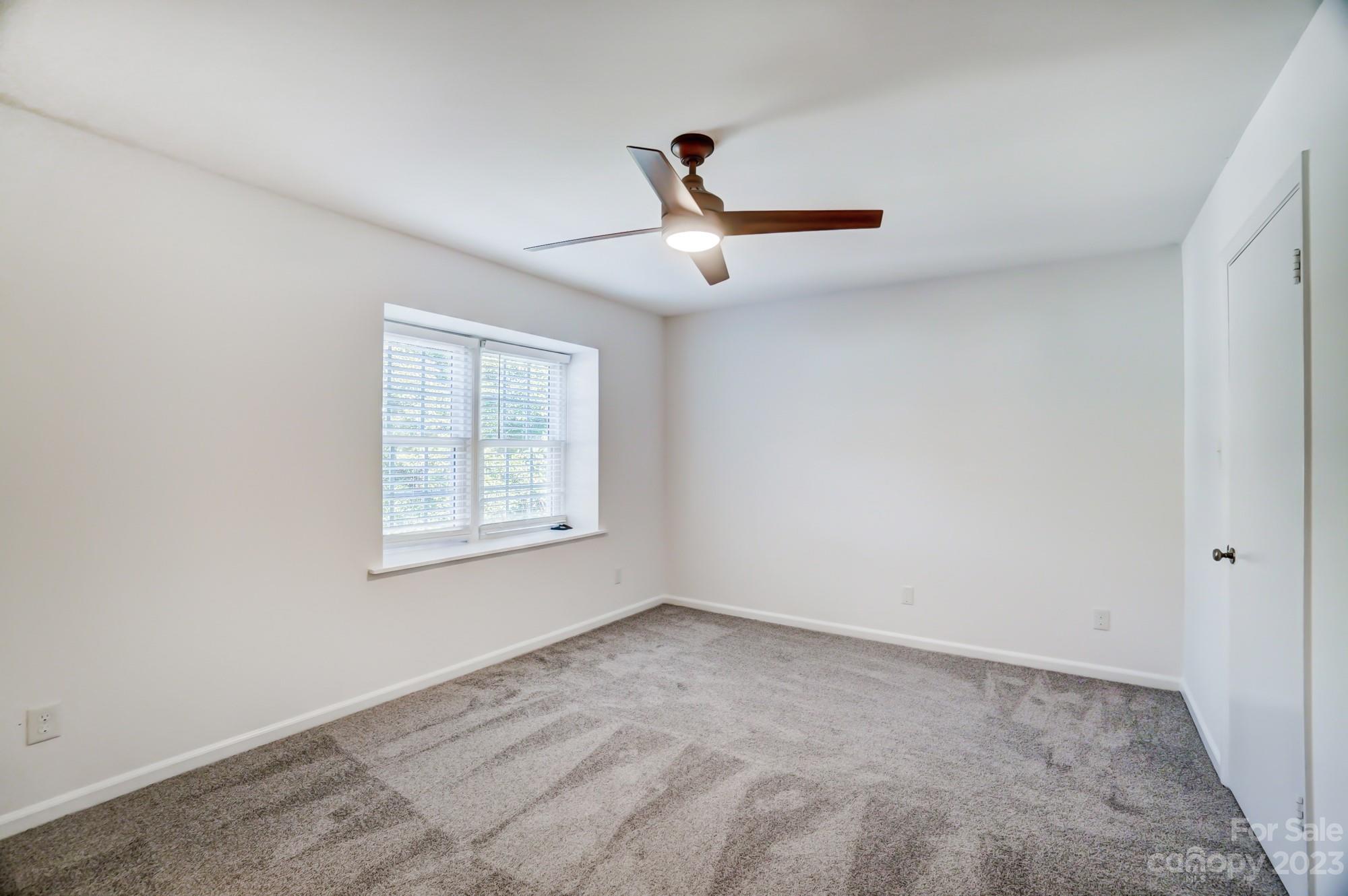 3500 Colony Road, Unit E Charlotte, NC 28211 - Photo 31 of 37 a view of an empty room with windows