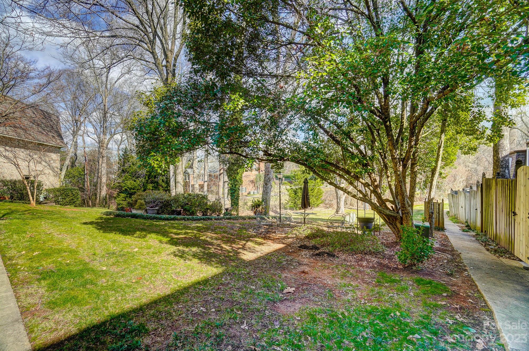 3500 Colony Road, Unit E Charlotte, NC 28211 - Photo 35 of 37 a view of a yard with plants and trees