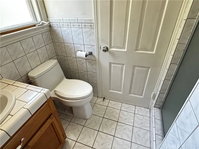 a view of a backyard with sitting area