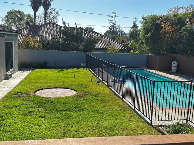 a view of a swimming pool from a balcony