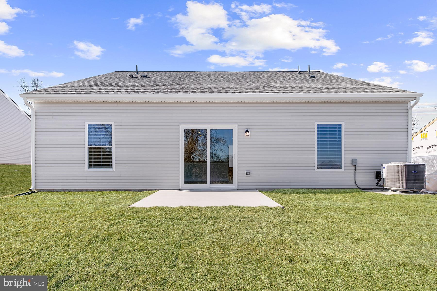 5211 McCormick Avenue Baltimore, MD 21206 - Photo 2 of 20 a view of a house with a yard and sitting area